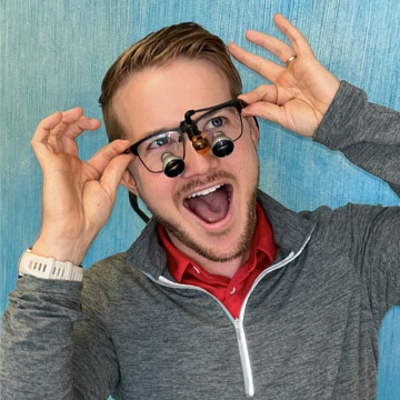 Pediatric dental staff member wearing black scrubs in a clinical setting in Arnold, MO